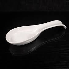 It's crafted of durable stoneware and finished with a white glaze to fit seamlessly into a range of contemporary kitchens while providing prot… Ceramic Spoon Rest In White Cookware Home Living Vadel Com