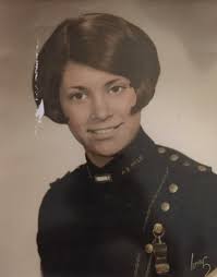 Hello, This is my mother's senior portrait, and I am hoping it can be fixed  up a bit. She has passed away and we would like to use it