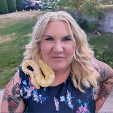 14 month old Ichigo, he's been a growin. Plus my King snake Zangetsu.