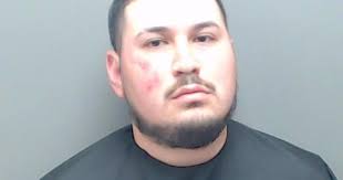 Marshall pedestrian hit by car, man arrested