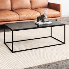 This minimalist and elegant piece is a combination of organic and geometric. Temple Webster 110cm Black Serena Marble Coffee Table