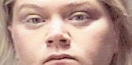 Muncie woman held in knife attack