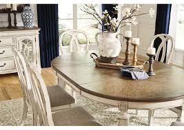 When unfolded, a drop leaf dining room table will typically have a square or rectangular top shape. Realyn Dining Room Extension Table Ashley Furniture Homestore Independently Owned And Operated By Hamad M Al Rugaib Sons Trading Co