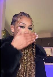 Rae Burrell Angel Reese