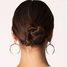 Use the bobby pins to tuck inside the hair strands. 30 Easy Buns For Long Hair Inspired By Celebrities