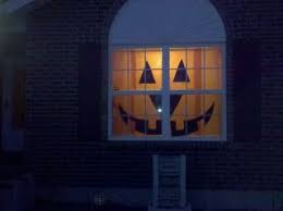 Jack O Lantern Window Decoration Orange Tissue Paper And Black Construction Paper An Easy Halloween Decorations Halloween Window Halloween Window Decorations