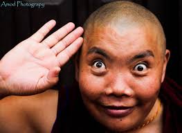 Man in moment of inner peace in Kathmandu market
