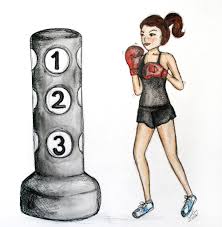 Boxer feminino em pé na posição defensiva e posando para câmera. Kimax Aula Que Mistura Boxe Kickboxing E Muay Thai Vida Boa