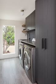 You can look at machines that are streamlined when you've got a household. 75 Beautiful Modern Laundry Room Pictures Ideas July 2021 Houzz