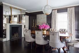 Dining Room With Antiqued Mirrored Fireplace Wall Transitional Dining Room