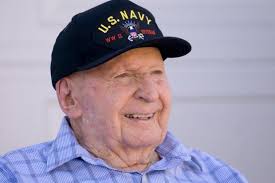 U.S. Naval officers surprise Lake Forest WWII vet with rendition of  'Anchors Aweigh'