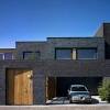 We need to replace the soffitt, facia and other trim boards on the house and also want to reface the brick, without removing it. 1