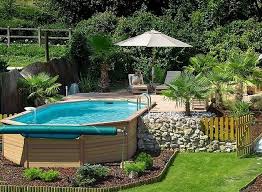 The convenience of a pool deck is it allows you to easily get into the pool without the use of a ladder or the need to lift yourself up get into the water. Cool Above Ground Pool Ideas Above Ground Swimming Pools Designs Small Backyard Pools Above Ground Pool Landscaping Above Ground Swimming Pools