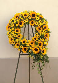 Maybe you would like to learn more about one of these? Radiant Sun Wreath In Santa Fe Springs Ca Le Fleur Floral Couture Funeral Flower Arrangements Funeral Floral Arrangements Funeral Flowers