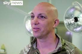 Afghan baby handed over fence to US soldiers reunites with mom