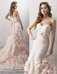 It takes the form of the wearer's body. Friday Favorite Blush Mermaid Wedding Dress Sorrento