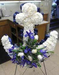 Top rated rapid city, sd funeral homes: Sympathy Arrangement Ship Anchor Standing Spray Blue Iris And White Carnations With Roses Designe Funeral Flower Arrangements Funeral Floral Sympathy Floral