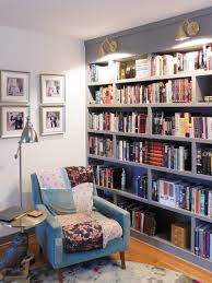 offset bookshelves in gray with integrated lighting cozy reading nook in an asheville home book built in shelves living room bookshelves in living room home
