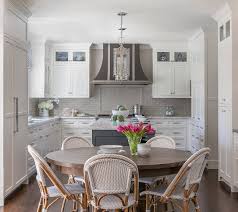 Black and wood kitchen cabinets with white countertop. Classic White Kitchen With Grey Backsplash Home Bunch Interior Design Ideas