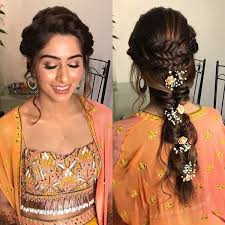 The dutch braid (versus the french braid) is created by braiding strands under each other rather than on top of each other, often creating a more voluminous result. Pretty Braided Hairdo Inspiration For Wedding Ceremonies By Real Brides Shaadisaga