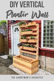 These planters are perfect to grow small houseplants and create your own living wall. Diy Vertical Garden Wall Planter With Plans The Handyman S Daughter