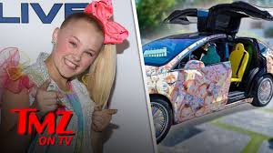 View this video on youtube. Jojo Siwa S New Tesla Is Wrapped In Her Face Tmz Tv Youtube