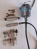 Tools used for wood carving, such as knives, chisels, and ...