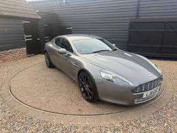 Image result for Tungsten Silver 2011 Aston Martin