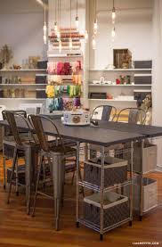 I have been working on decorating it and. Studio Tour Our Craft Room Lia Griffith Craft Room Lighting Craft Room Design Craft Room Office