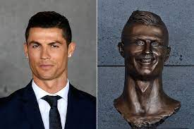 No need to register, buy now! Cristiano Ronaldo Poses With Questionable Bronze Statue Time