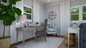 Couple decorating room in new home and painting wall together. 5 Easy Steps To Decorate Your New Home Jenna Gaidusek Designs