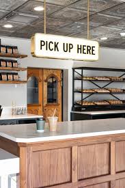A Look Inside Magnolia Press Magnolia Coffee Shops Interior Coffee Shop Interior Design Cozy Coffee Shop