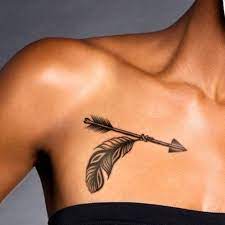 75 Unique Arrow Tattoos Meanings 2021 Guide Chest Tattoos For Women Tattoos For Women Chest Tattoo