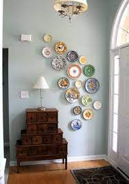 Each one of these round beauties is a little work of art in my opinion, and i love to hang them on my walls to enjoy. How To Arrange A Decorative Plate Wall Addicted 2 Decorating Home Decor Plates On Wall Decor