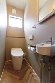 海辺のリゾートのような家 京都で注文住宅を建てるデザオ建設のフォトギャラリー トイレ インテリア トイレ 壁紙 おしゃれ 無印良品の家