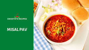 Maharastrian misal pav is a spicy moong sprouts curry topped with onions, sev, lemon and served with salt to taste. Misal Pav Recipe Swasthi S Recipes