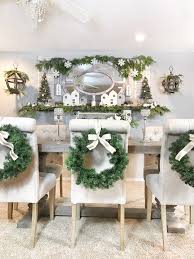 Christmas Dining Room Table Large Wreaths Hanging From The Chairs W Christmas Dining Room Table Decor Christmas Dining Table Decor Christmas Dining Room Table