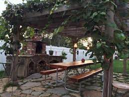 Birch trees weave through the protruding panels of the wall integrating the design with the garden. 7 Ideas For Your Outdoor Diy Patio Cover Diy Patio Cover Ideas From Pergola Depot