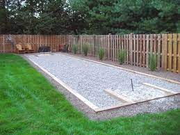 Back yard hand built horse shoe pits with led lights #madebycoltskinner. Horseshoe Pit Like The Gravel Field Outdoor Backyard Backyard Backyard Landscaping