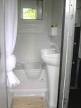 Compact shower toilet combo