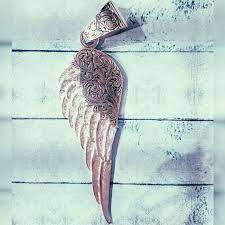 The Angel Wing Pendant Meaning & Symbolism | Hyo Silver