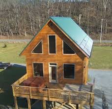 11 very large wooded lots with easy road. 3 Cozy Log Cabins On The River Gander Island Cabins