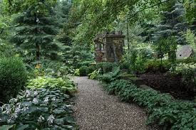 Use a spacer stick cut to the width of the garden path as. Ways To Landscape With Stone And Mulch Hgtv