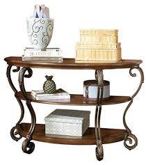 We did not find results for: Signature Design By Ashley Nestor Traditional Semi Circle Sofa Table W Two Shelves Medium Brown Buy Online In Qatar At Qatar Desertcart Com Productid 32742525