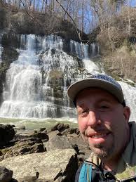 Should I visit Rock Island park or Fall Creek Falls for a short trip in  Tennessee?