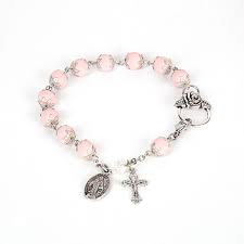 Induce (a plant) to produce flowers. Jewelry Keepsakes Rosaries Inc