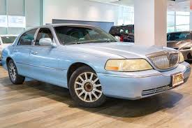 Image result for Light Ice Blue 2007 Town Car