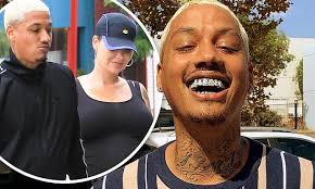 Amber Rose's beau Alexander 'AE' Edwards flashes permanent new $250K  diamond grill