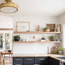 Gorgeous Modern Farmhouse Kitchen With Navy Cabinets Nad Open Shelves Subway Tile And Gold Li Diy Kitchen Renovation Before After Kitchen Kitchen Inspirations