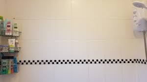 Remove the paper towels from the grout and use your brush to scrub any remaining mold or mildew. Twitter